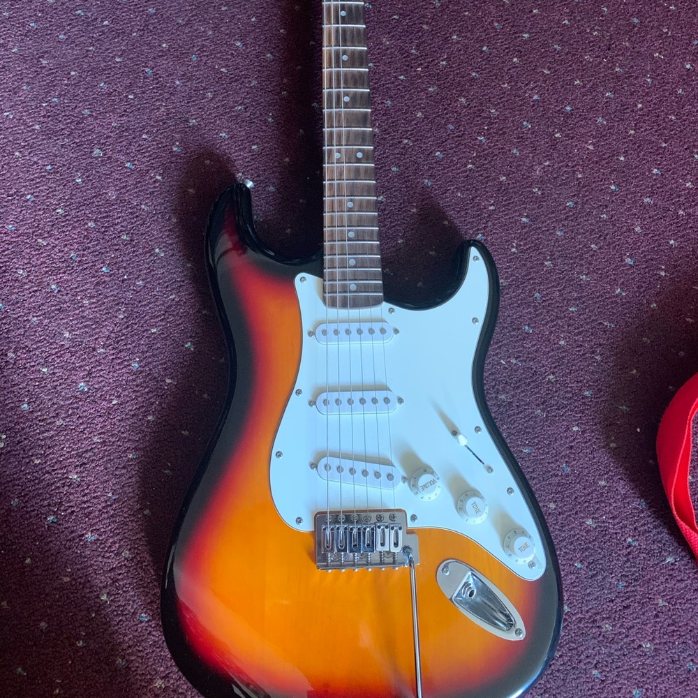 Adult guitarra
